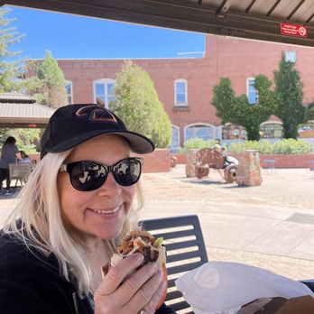 Diablo Burger - Happy person eating Burger at Heritage Square. - Burgers Near Me - Flagstaff, Arizona Diablo Burger - Happy person eating Burger at Heritage Square. - Burgers Near Me - Flagstaff, Arizona