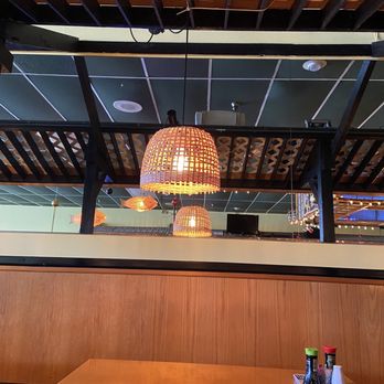 Thai Thai I - a table and chairs in a restaurant - Thai Near Me - Melbourne, Florida