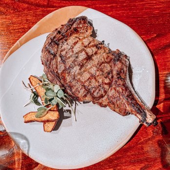A Land Remembered - Bone-In Ribeye* - Steakhouses Near Me - Orlando, Florida A Land Remembered - Bone-In Ribeye* - Steakhouses Near Me - Orlando, Florida