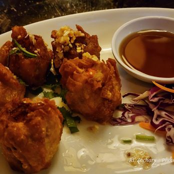 Thai Treasure - Chicken dumplings, fried. You can also get them steamed - Thai Near Me - Arlington, Virginia