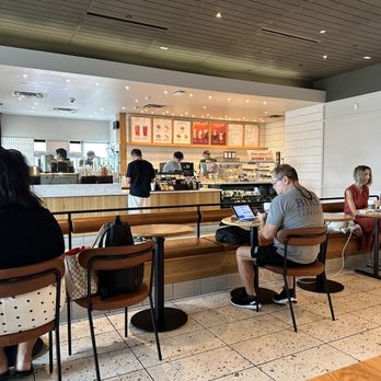 Starbucks - people sitting at tables in a coffee shop - Coffee & Tea Near Me - Palm Springs, California