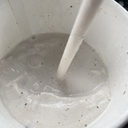 Milkshake after extremely small sip (before getting clogged with unmixed ice cream). Milkshake after extremely small sip (before getting clogged with unmixed ice cream).