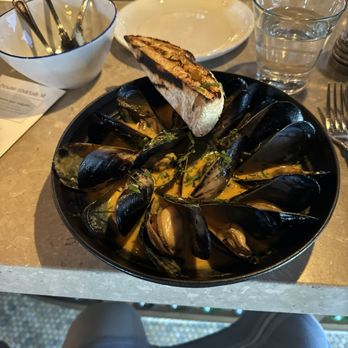 Whitestone Restaurant & Bar - Sautéed muscles and a curry broth - New American Near Me - Dana Point, California Whitestone Restaurant & Bar - Sautéed muscles and a curry broth - New American Near Me - Dana Point, California