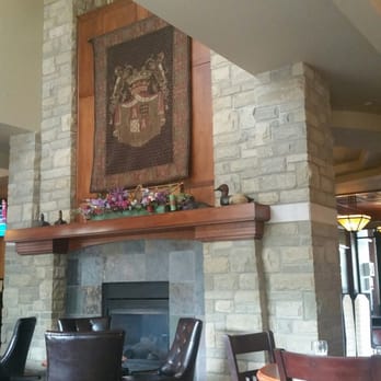 Canthooks Restaurant - a dining room with a fireplace - German Near Me - Calabogie, Ontario