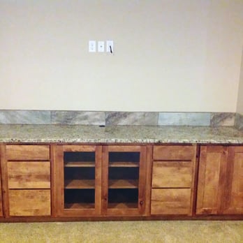 Carpet Direct - a kitchen with a marble counter top - Carpeting Near Me - Pueblo West, Colorado