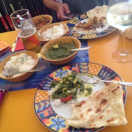 Palak paneer in front, chicken Marsala madras in the back