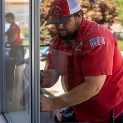Dutch Touch Window Cleaning - Dutch Touch team delivering crystal clear windows