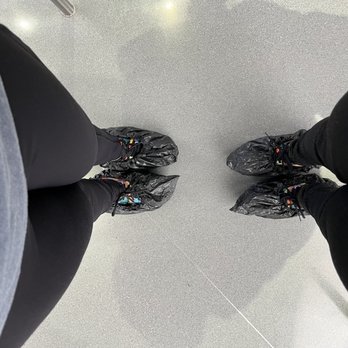 Summit One Vanderbilt - Shoe covers for alll the mirrors. Ps. Bring sunglasses  esp if going during a sunny day! - Observatories Near Me - New York, New York