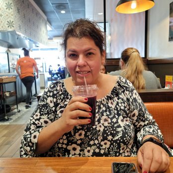 Cafe De Olla - My wife enjoying her Hibiscus drink. - American Near Me - Monrovia, California Cafe De Olla - My wife enjoying her Hibiscus drink. - American Near Me - Monrovia, California