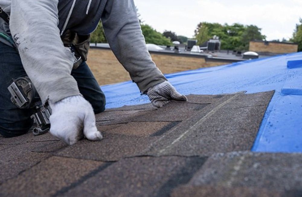 Slide of Green Group Roofing
