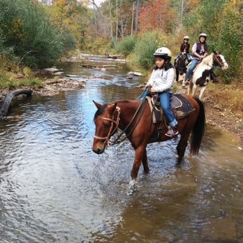 The Rocking S Ranch - My 8-yr old, terrified when we left, a total pro an hour later. Again, photographed by Bill, the owner of Rocking S Ranch. - Horseback Riding Near Me - Winchester, Virginia