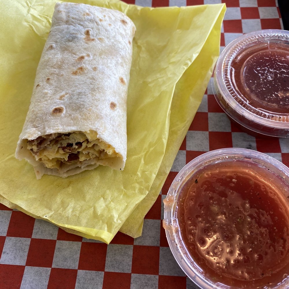 Breakfast burrito with egg and bacon. Delicious! Breakfast burrito with egg and bacon. Delicious!