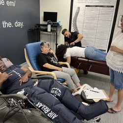 Carpe Diem Chiropractic - Leg compression and adjustments