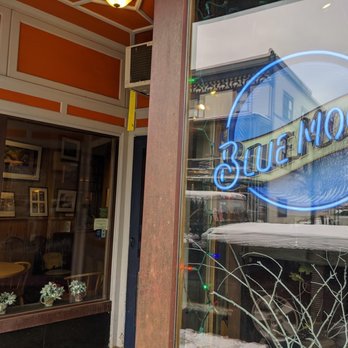 Blue Moon Cafe - the reflection of a building in the window - New American Near Me - Saranac Lake, New York Blue Moon Cafe - the reflection of a building in the window - New American Near Me - Saranac Lake, New York