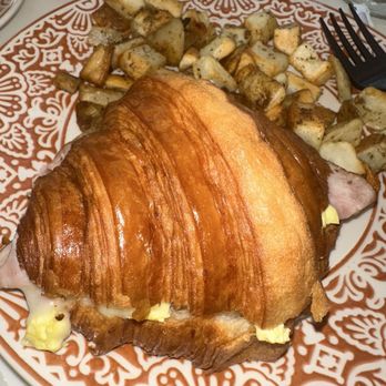 Bon Bouquet Cafe - Turkey egg and cheese croissant with side of potatoes - Breakfast & Brunch Near Me - Miami Beach, Florida