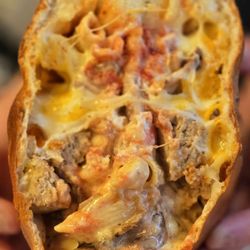 Eatz Pizzeria & Deli - Macaroni and cheese, mushroom, and meatball calzone