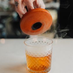 French Vanilla JW Dant BIB Kentucky bourbon with vanilla, cognac, bitters, orange, smoked with apple wood.