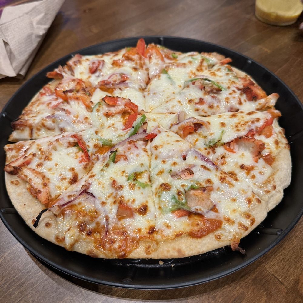 Chicken tikka pizza