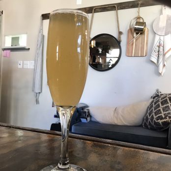 Roots Cafe - Peach Mimosa - Cafes Near Me - Charlotte, North Carolina