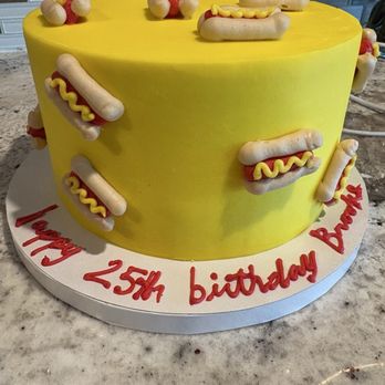 Sweet Scape Bakery - Great job on this custom hot dog birthday cake with vanilla cake and vanilla frosting with cream cheese filling. So delicious and moist. - Cupcakes Near Me - Scottsdale, Arizona Sweet Scape Bakery - Great job on this custom hot dog birthday cake with vanilla cake and vanilla frosting with cream cheese filling. So delicious and moist. - Cupcakes Near Me - Scottsdale, Arizona