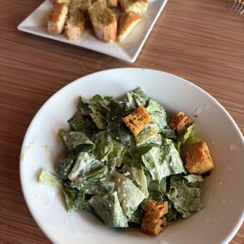 Agliolio - Caesar salad and garlic bread. It came with the dinner. - Italian Near Me - Boynton Beach, Florida Agliolio - Caesar salad and garlic bread. It came with the dinner. - Italian Near Me - Boynton Beach, Florida