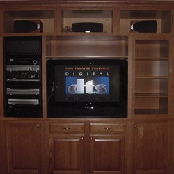Home Audio/Video - Costello job - Middle Atlantic roll-out equipment rack inside built-in custom cabinet.