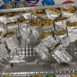 Breakfast Burritos with Bacon, Potatoes, and Sausage Breakfast Burritos with Bacon, Potatoes, and Sausage