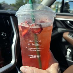 Starbucks - Strawberry Aa Refresher add a splash of black tea.  So good