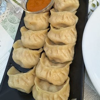 Restaurant ODAAN - Chicken momos. That dip was spicy! - Indian Near Me - Lisbon, 11