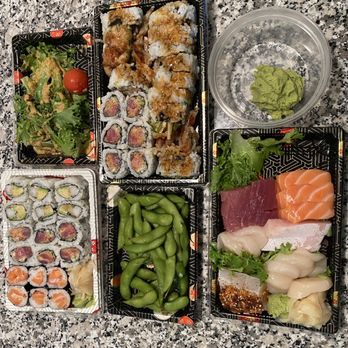Sakana - Sashimi dinner, sushi dinner, two soft shell crab rolls, edamame, extra wasabi.     Not in the picture is miso soup and rice for the Sashimi - Sushi Bars Near Me - Cambridge, Massachusetts