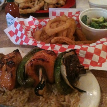 Boston's Fish House - Salmon kabobs on a bed of rice with two sides. Nice portion! - Seafood Near Me - Winter Park, Florida Boston's Fish House - Salmon kabobs on a bed of rice with two sides. Nice portion! - Seafood Near Me - Winter Park, Florida