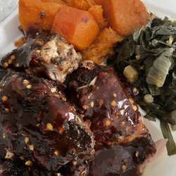 Grill N Dutchy - Jerk with extra sauce, yams and greens