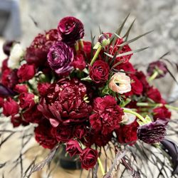 Fuji Wholesale Flowers - December 2024 bouquet, shades of red scarlet and wine.