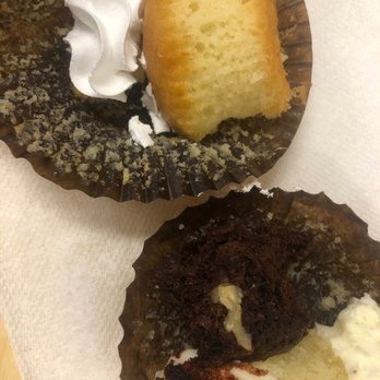 Famous Creations - Chocolate walnut, vanilla, banana cream cupcakes. You can see the frosting separated from the cupcakes. - Bakeries Near Me - Fairfield, California