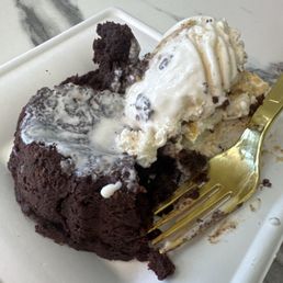 Molten lava cake with golden Oreo ice cream