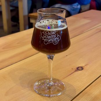 Oxbow Blending & Bottling - Noel, seasonal dark famhouse ale - Breweries Near Me - Portland, Maine