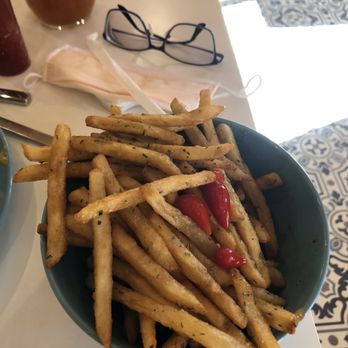 The Yellow Carrot - Rosemary brown butter fries, those are red chilies but the fries weren't spicy at all. They're very good. - Caterers Near Me - Durango, Colorado The Yellow Carrot - Rosemary brown butter fries, those are red chilies but the fries weren't spicy at all. They're very good. - Caterers Near Me - Durango, Colorado