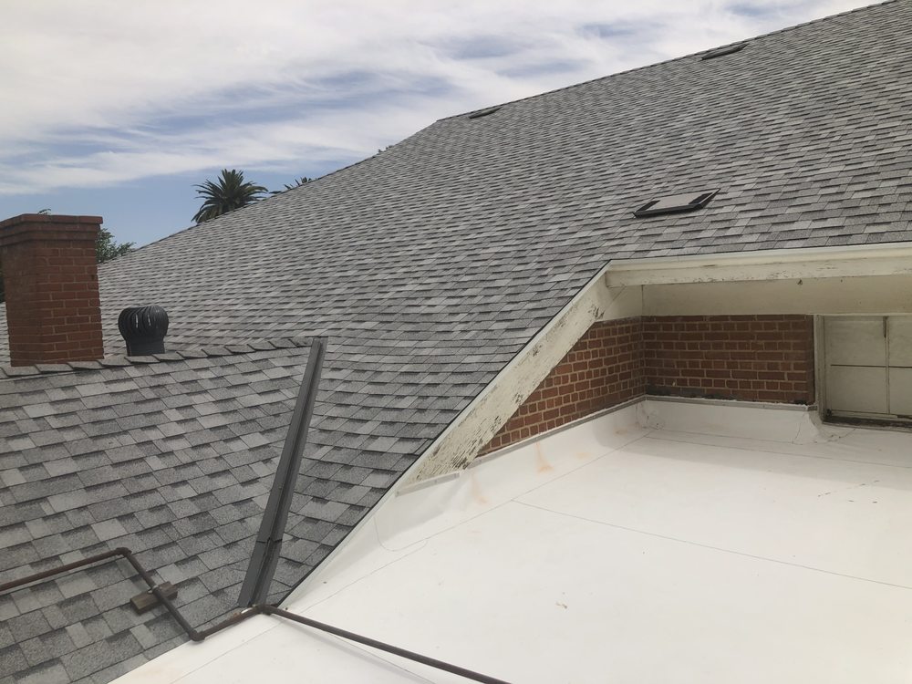 Slide of Econo Roofing