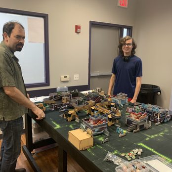 Third Coast Games - More father-son fun, this time playing Infinity. - Tabletop Games Near Me - Friendswood, Texas