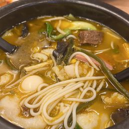 Stewed beef and golden spicy broth Stewed beef and golden spicy broth