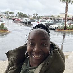 Me.....in the rain but it's covered in front of all the store.