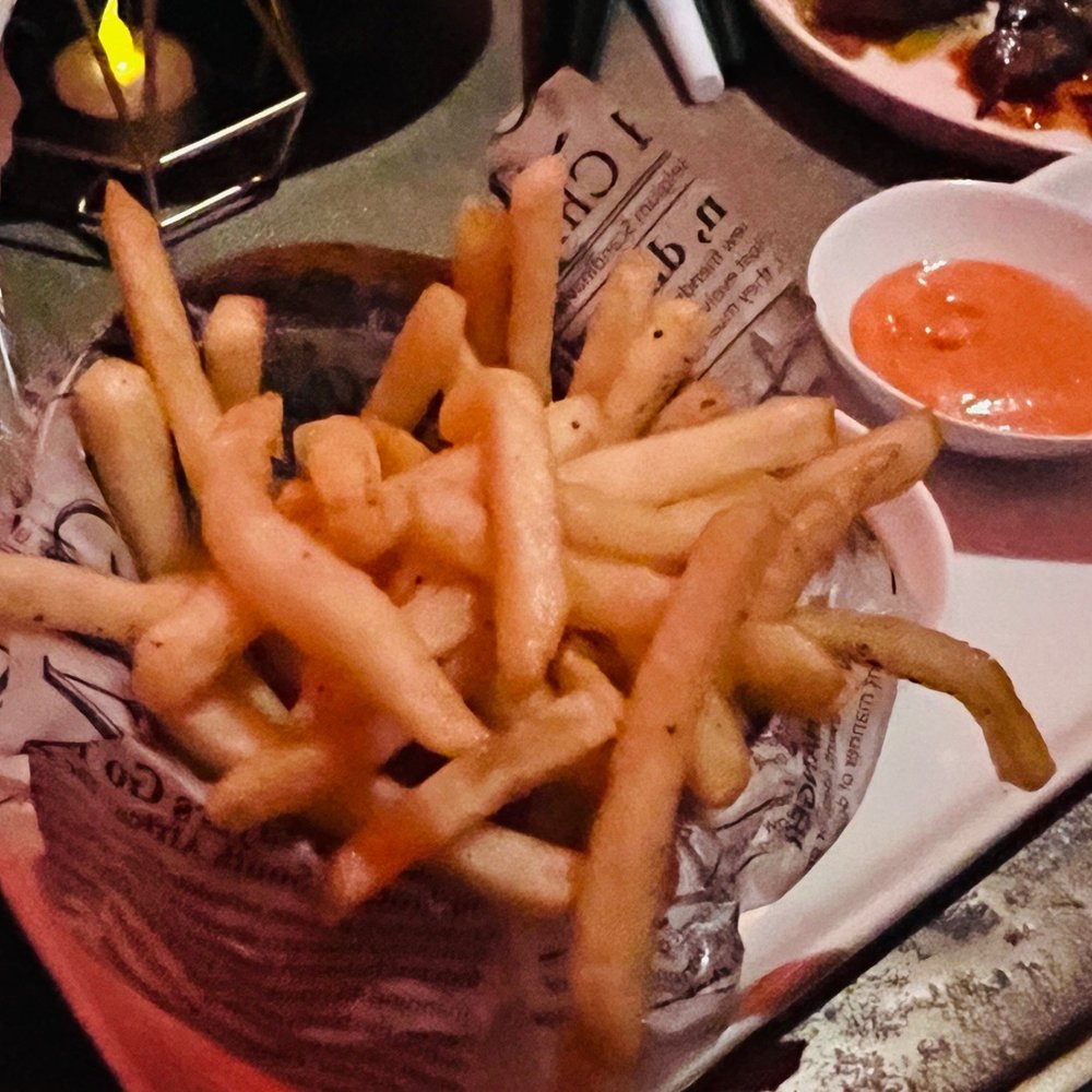 The Foundation Room - Bistro Fries. My favorite thing of the three items we ordered. Comes with red pepper aioli and tamarind chutney. - Lounges Near Me - New Orleans, Louisiana The Foundation Room - Bistro Fries. My favorite thing of the three items we ordered. Comes with red pepper aioli and tamarind chutney. - Lounges Near Me - New Orleans, Louisiana