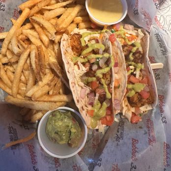 Bubba's 33 - Shrimp, taco fries and a side of honey mustard, and guacamole. My shrimp was cold. - Sports Bars Near Me - Pensacola, Florida Bubba's 33 - Shrimp, taco fries and a side of honey mustard, and guacamole. My shrimp was cold. - Sports Bars Near Me - Pensacola, Florida