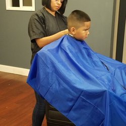 Ramos Barber Shop - Our little customer getting his haircut ready for school