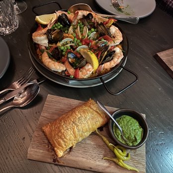 Mita's Restaurant and Bar - Paella and an empanada - Spanish Near Me - Cincinnati, Ohio Mita's Restaurant and Bar - Paella and an empanada - Spanish Near Me - Cincinnati, Ohio