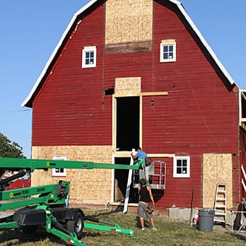 Midwest Roofing & Construction - a red barn being built - Roofing Near Me - Dodgeville, Wisconsin Midwest Roofing & Construction - a red barn being built - Roofing Near Me - Dodgeville, Wisconsin