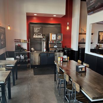 Dog Haus Biergarten - A small dining area near the front counter. - Burgers Near Me - Tempe, Arizona Dog Haus Biergarten - A small dining area near the front counter. - Burgers Near Me - Tempe, Arizona