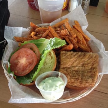 Dockside Tropical Cafe - Grouper sandwich with sweet potato fries - Caribbean Near Me - Marathon, Florida Dockside Tropical Cafe - Grouper sandwich with sweet potato fries - Caribbean Near Me - Marathon, Florida