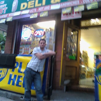 Kemoo Complete Deli & Grocery - a man standing in front of a store - Delis Near Me - Ridgewood, New York Kemoo Complete Deli & Grocery - a man standing in front of a store - Delis Near Me - Ridgewood, New York