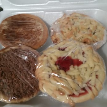 Pie Boss - From top left to bottom right: Vanilla Custard, Apple Crumble, Chocolate Custard, and Cherry. All scrumptious. - South African Near Me - Aurora, Illinois Pie Boss - From top left to bottom right: Vanilla Custard, Apple Crumble, Chocolate Custard, and Cherry. All scrumptious. - South African Near Me - Aurora, Illinois